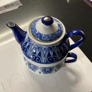 Tea pot and cup.